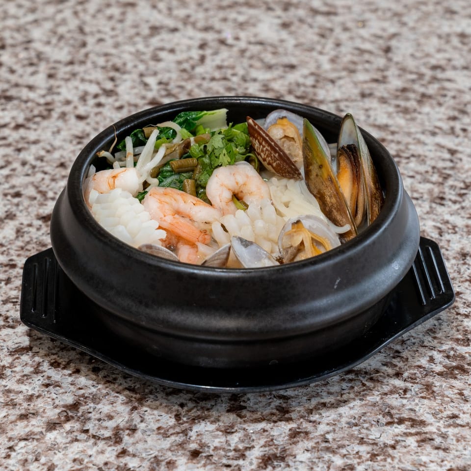 Seafood noodle soup with shrimp and shellfish.